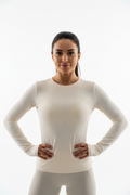 Front angle of woman wearing ribbed long-sleeve layer top