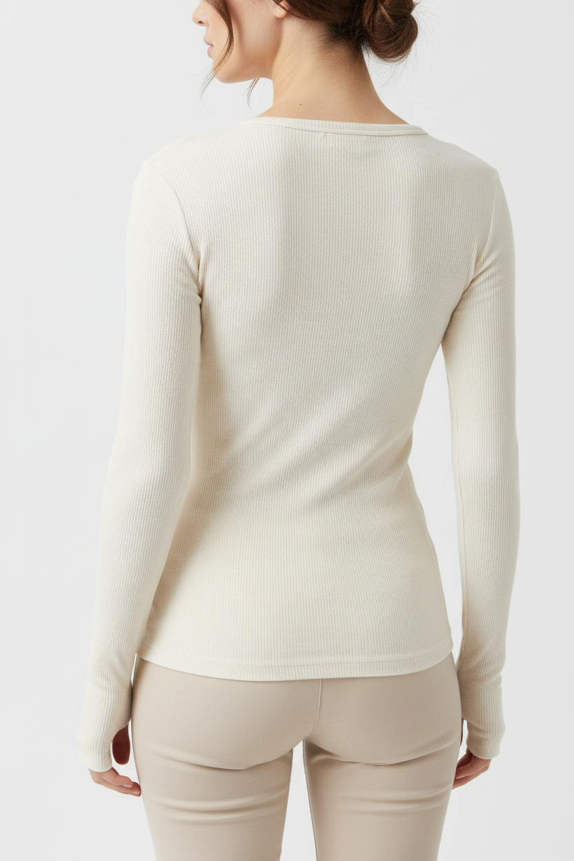 Back angle of woman wearing ribbed long-sleeve layer top